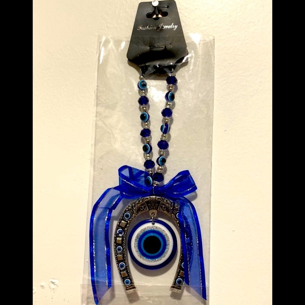 Blue Evil Eye Horse Shoe Hanging .